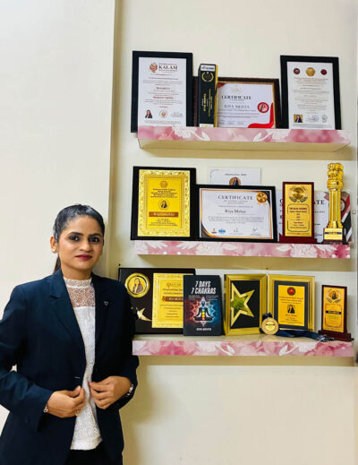 Riya Mehta with Awards and 7 Days 7 Chakras Book